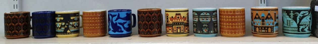 Quantity of 1970's Hornsea mugs including birthday mug, air balloon ship and castle decorated, one