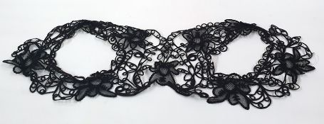 Victorian black lace trimmings off a jacket/cloak or a bolero-style jacket