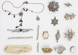 Quantity of marcasite set brooches, silver bar brooch, diamante and other items in leather-covered