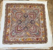 Indian/Persian embroidery, inverted cone paisley pattern, backed onto cloth with added braid detail.