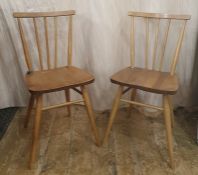 Set of four mid-20th century light elm Ercol seated and beech stick-back and framed dining chairs