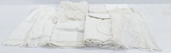 Net christening gown embroidered with flowers with under petticoat, assorted linen and cotton