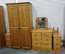 20th century pine two-door wardrobe, a chest of drawers, two bedside cabinets, two headboards and