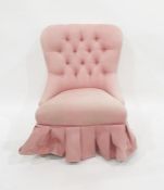 Modern bedroom chair in pink buttonback upholstery