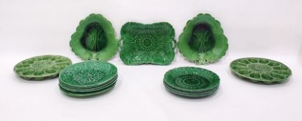 Quantity of green glazed leaf moulded majolica pla