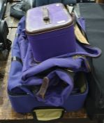 Purple canvas and leather travelling vanity case marked T. Anthony Limited with matching suit