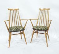 Two elm seated Ercol stick back carver chairs with beech frames (2)