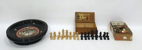 Set of stained wood chess pieces, an ebonised wood roulette wheel and a quantity of counters