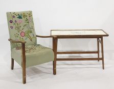 1930's armchair with needlework upholstered seat and back and a rectangular coffee table with