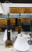 Pair of brass and lacquer finished table lamps in the form of ionic columns on stepped square bases,