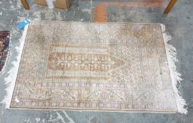 Early 20th century Turkish prayer rug in brown, fawn, pink and blue, on stepped border, 132cm x 87cm