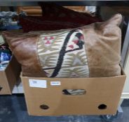 Pair of hide and kelim patch cushions with corduro