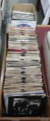 Case of 45rpm singles to include examples by Wings, UB40, Tom Robinson Band 