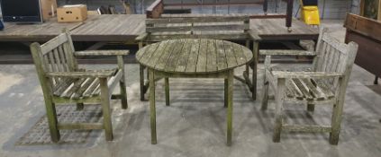Garden furniture to include bench, two chairs and circular table