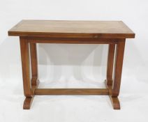 Biedermeier walnutwood centre table, rectangular and on incurved rectangular twin supports, cheval