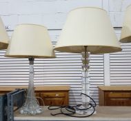 Two glass bodied table lamps, one with a clear gla
