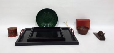 Collection of Oriental black lacquered trays with red branch handles, a green and black mottled
