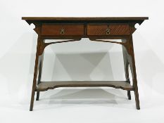 Early 20th century oak Arts & Crafts desk, the rectangular top above two drawers, supported by