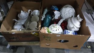 Six boxes of china and glassware to include large brandy balloon, decanters, vases, plant pot