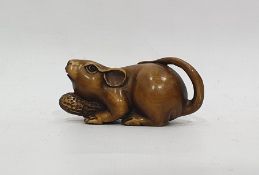 Japanese carved horn netsuke in the form of a mouse with monkey nut, signed to base, 6.5cm wide