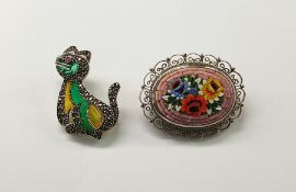 Marcasite and stained glass cat brooch and an Italian pietre dura brooch, oval with rose design
