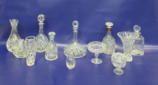Cut glass spirit decanter, club-shaped with silver mounted neck and the cut mushroom-shaped stopper,