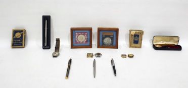 Assorted items to include playing cards, commemorative coins, pens, watches, etc