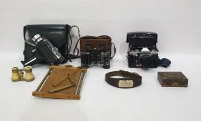 Bell & Howell Auto Load Cine Camera in leather carry case, a pair of binoculars, a Pentagon