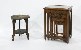 Oriental two-tier hexagonal coffee table with high relief carved top of dragon chasing pearl and a