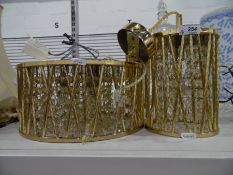 Two gilt metal graduated drum-shaped light fittings with cut glass prismatic drops (2)