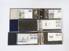 Box of miscellaneous albums, stock books, stamps and First Day Covers and a box of mostly modern