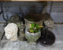 Seven composite garden planters and ornaments plus cast iron boot-scraper