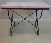 A vintage wrought iron console table with marble top, H.75 W.95 D.47cm