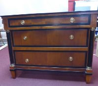 A Biedermeier style part ebonized walnut chest of drawers, with label for 'Century', H.83 W.106 D.