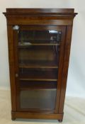 A Victorian mahogany display cabinet, with single drawer above glazed door, enclosing adjustable
