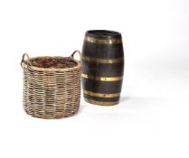 An oak and brass bound coopered barrel umbrella stand
