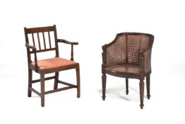 A carved beech and caned tub armchair, in Louis XVI style, 20th century