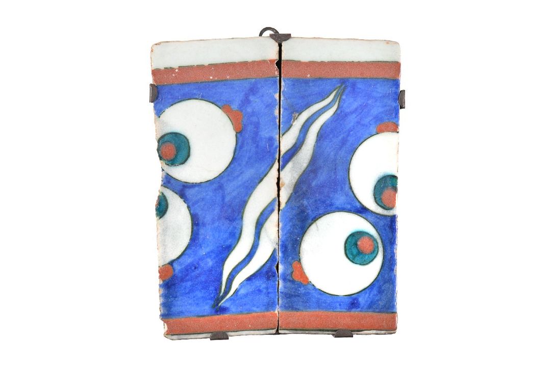 Two Iznik polychrome glazed fritware border tile fragments Ottoman Turkey circa 1570