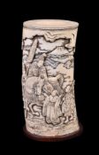 ϒ A good Japanese carved tusk vase depicting the poet Narihira with attendants