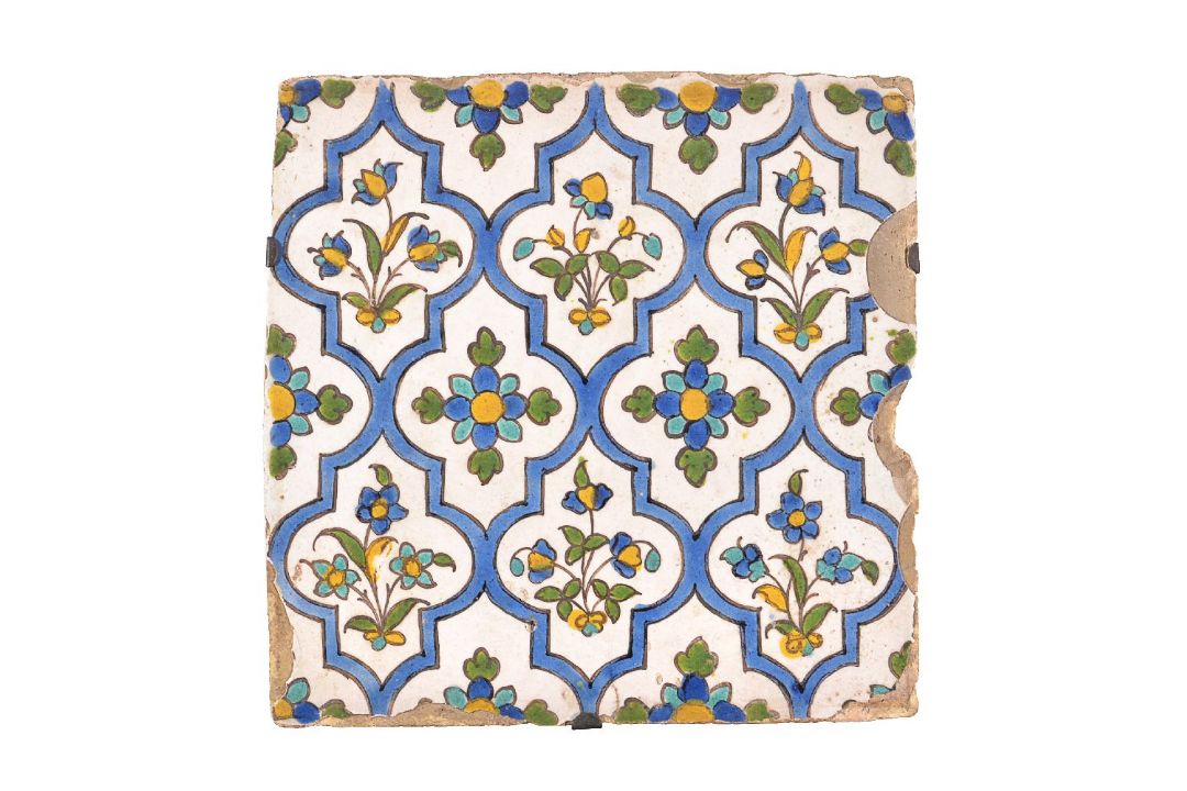 A Qajar Cuerda Seca glazed polychome glazed pottrey tile Persia probably circa 1800