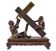 Miya-O Eisuke: A Japanese Parcel Gilt Bronze Group of a Carpenter and Boy