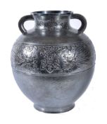 An unusual Japanese Silvered Metal Vase of globular form resting on a slightly splayed foot