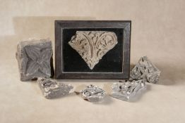A group of five relief carved limestone fragments of Mediaeval Gothic tracery