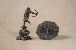 A Continental patinated bronze model of Cupid