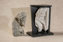 A sculpted limestone architectural fragment with the profile visage of a bearded man,