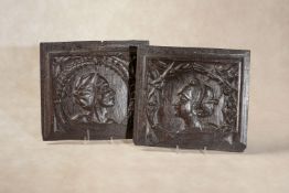 A pair of relief carved oak Romayne panels