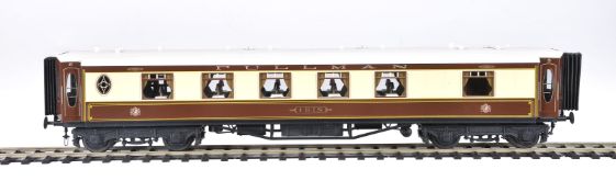 A rake of three gauge 1 Pullman coaches