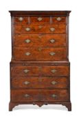 A George II burr walnut and feather banded chest on chest