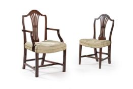 A set of twenty two mahogany dining chairs