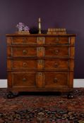 A Charles II oak chest of drawers